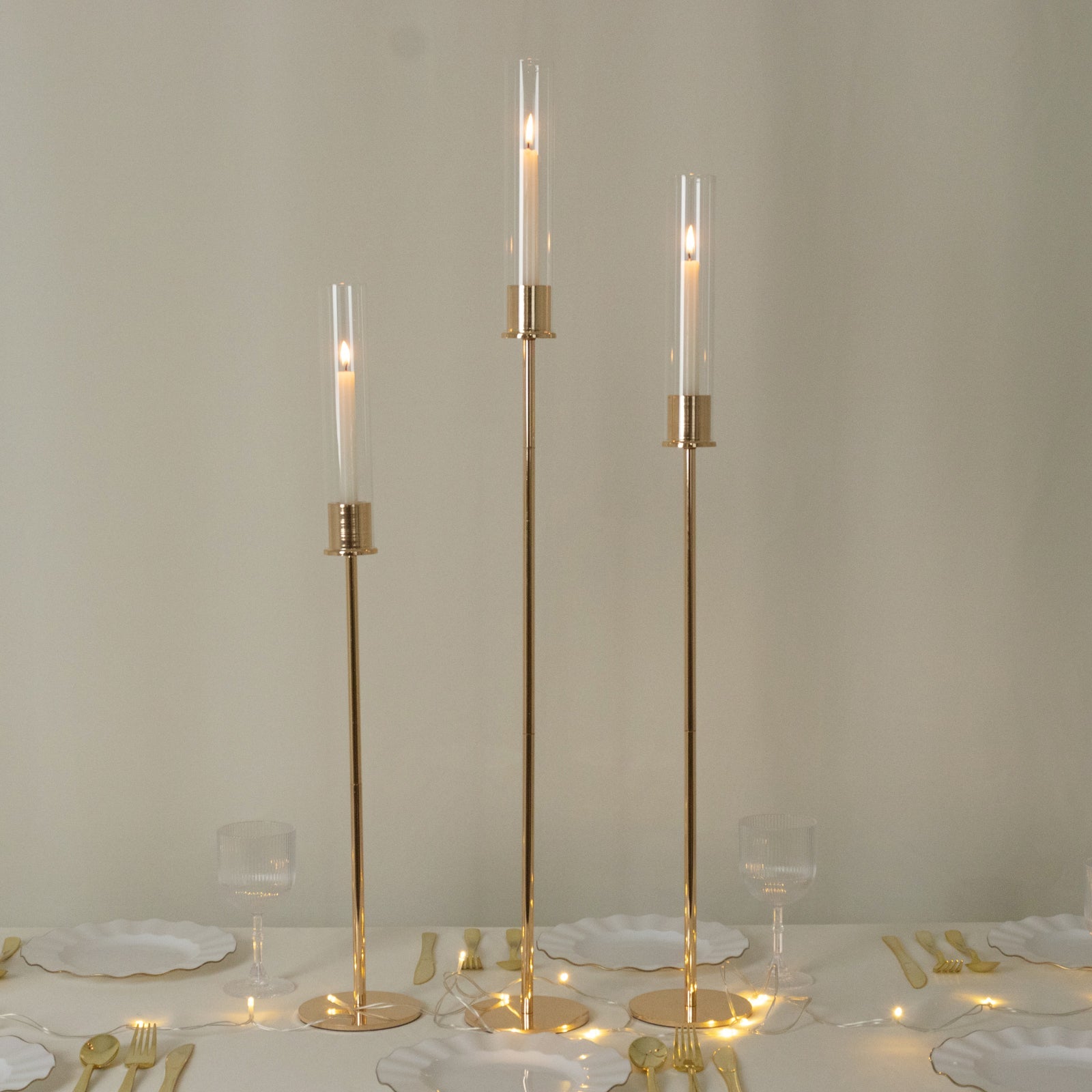 Gold Metal Taper Candle Holders with Hurricane Glass Shades, Set of 3 – Modern Minimalist Candlestick Stands – 28", 32", 36"