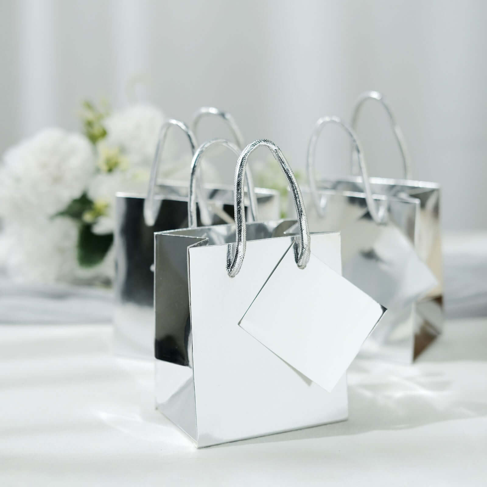 12 Pack 5" Shiny Metallic Silver Foil Paper Party Favor Bags With Handles, Small Gift Wrap Goodie Bags