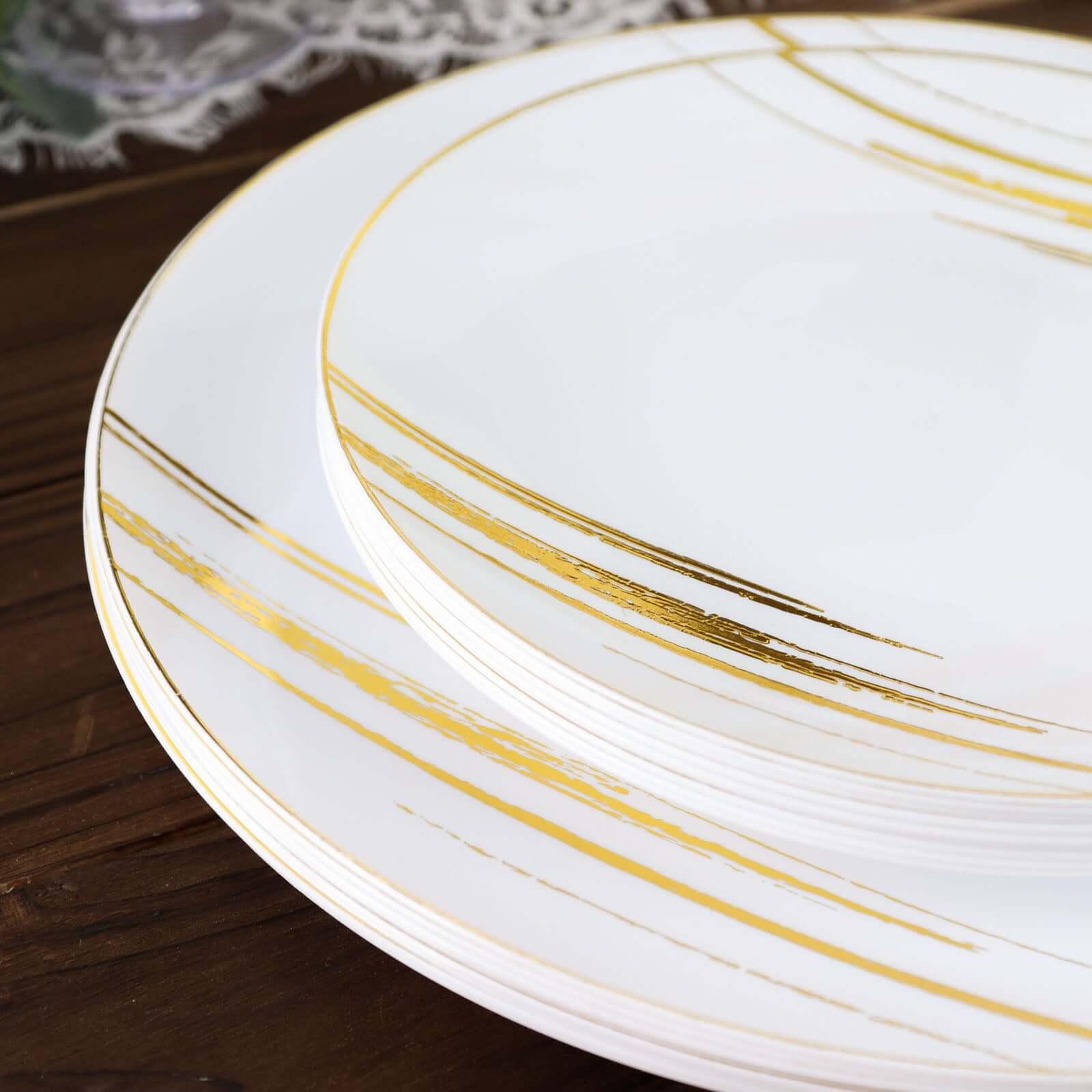 10-Pack Plastic 7" Round Dessert Plates in White with Gold Brush Stroked Print - Disposable Appetizer Salad Plates